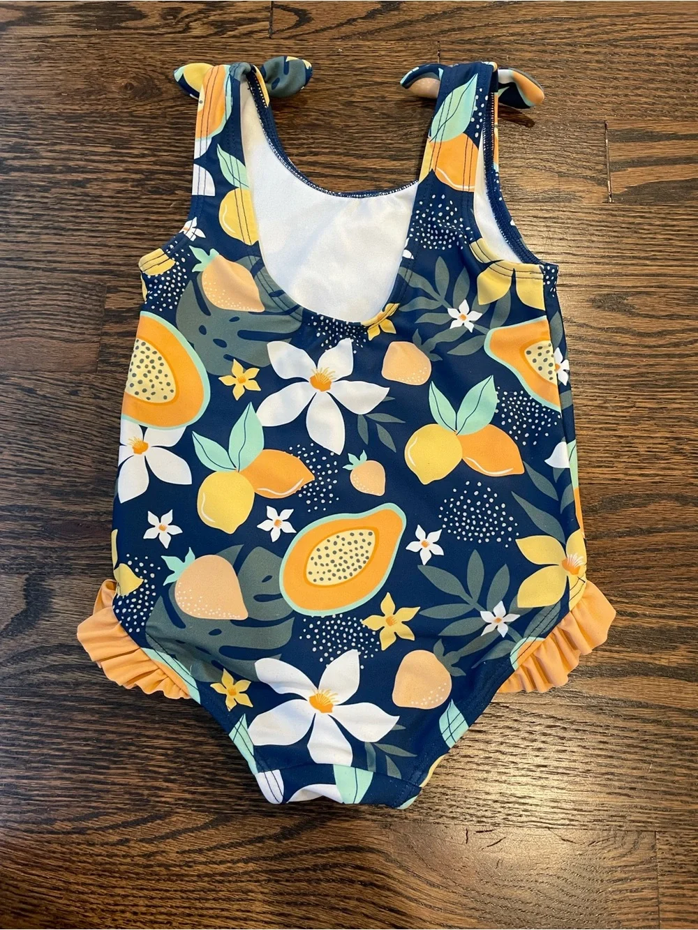 Ruffle Butts Navy Tropical Fruit Ruffle One-Piece Swimsuit
